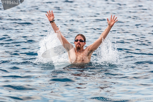 Image of Muscular swimmer in the water