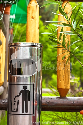 Image of Steel garbage bin outdoors