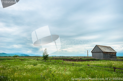Image of Little cottage with blue sky