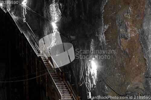 Image of Underground staircase a cave with bright light