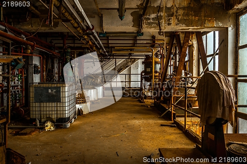 Image of Industrial interior with storage tank 