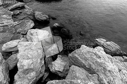 Image of Shore of an ocean with big rocks