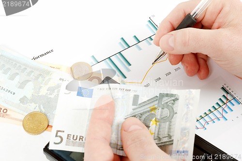 Image of money in hand, pen, chart, workplace businessman, business 