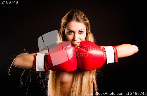 Image of beautiful nude girl with boxing gloves