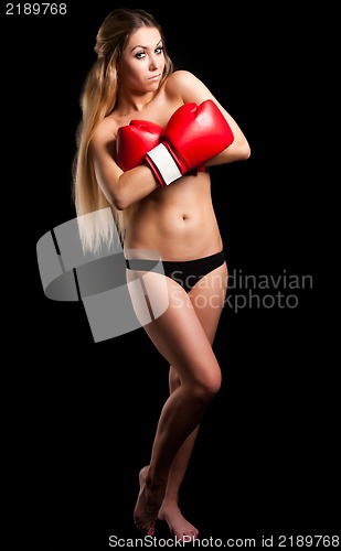 Image of beautiful nude girl with boxing gloves