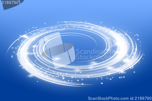 Image of Glowing swirl perspective on blue background