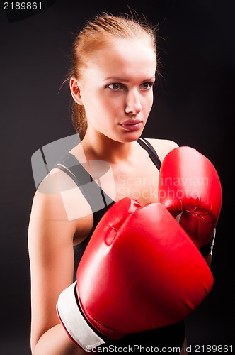 Image of Pretty girl with boxing gloves