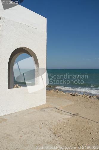 Image of Whitewashed ocean front house