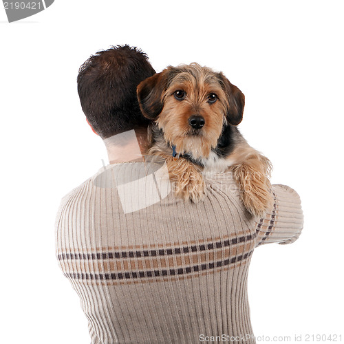 Image of Man Holding a Borkie Dog