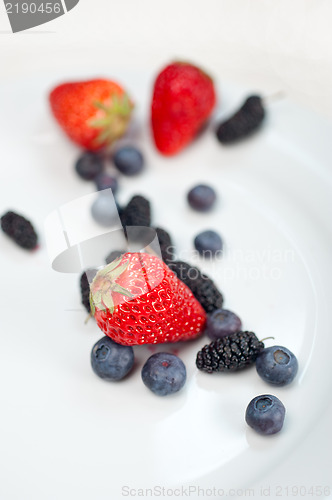 Image of berries on white plate