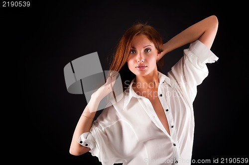 Image of young sexy woman in white shirt