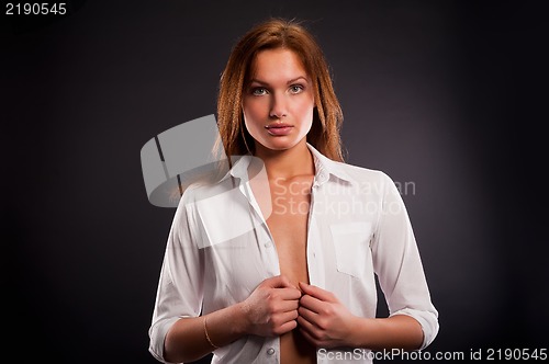 Image of young sexy woman in white shirt