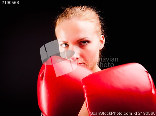 Image of Pretty girl with boxing gloves