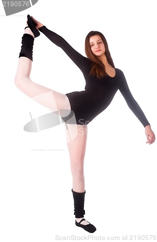 Image of fitness woman making balance exercise
