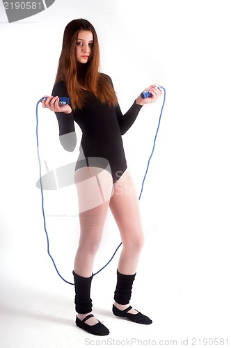 Image of fitness woman with jumping rope