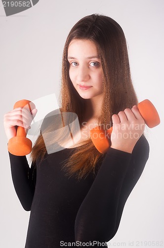 Image of Young fitness woman working out