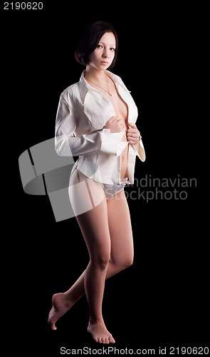 Image of young sexy woman in white shirt