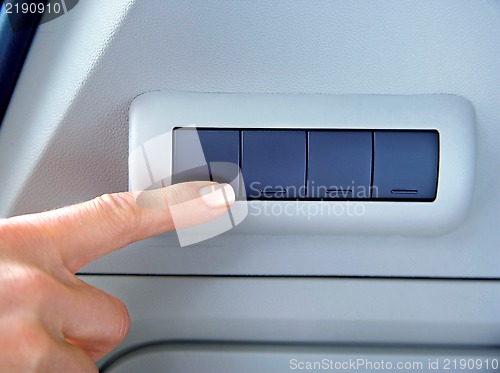 Image of finger on buttons