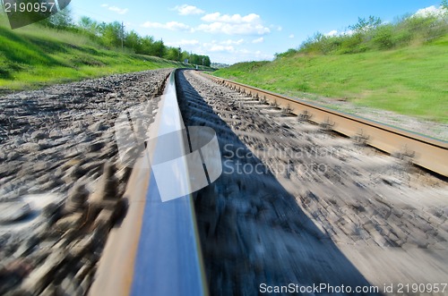 Image of railroad to horizon in motion