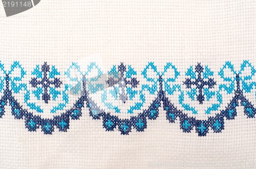 Image of embroidered good by cross-stitch pattern