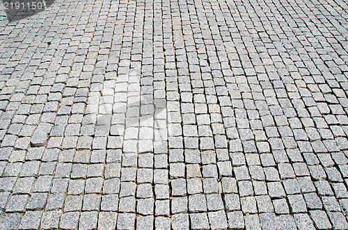 Image of cobbled road as background