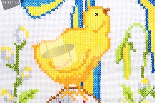 Image of embroidered good by cross-stitch pattern