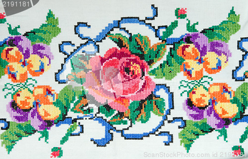 Image of embroidered good by cross-stitch pattern