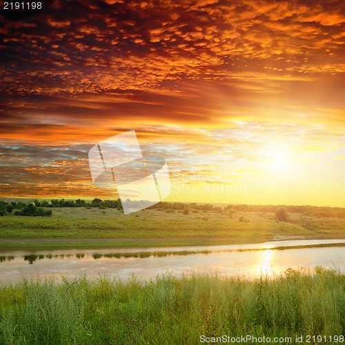 Image of golden sunset over river