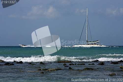 Image of harbor rock water boat yacht