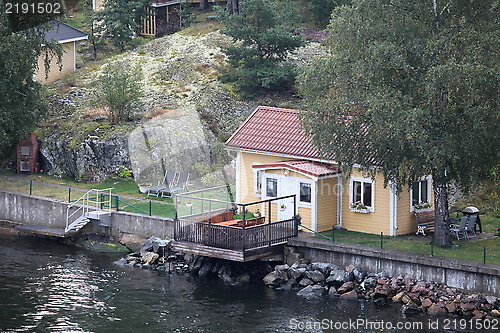 Image of house on the shore