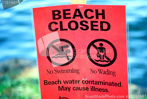 Image of Beach closed sign.