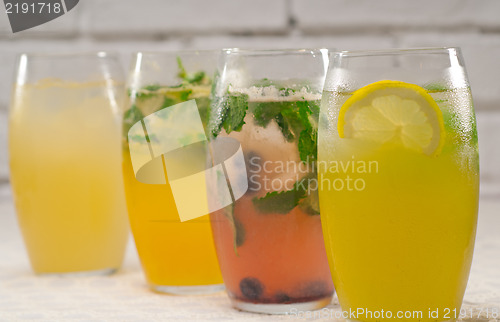 Image of selection of fruits long drinks