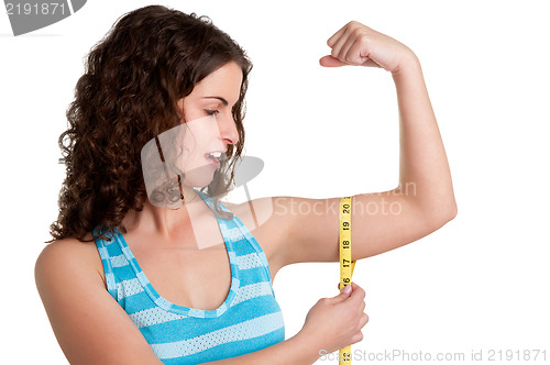 Image of Surprised Woman measuring her Biceps