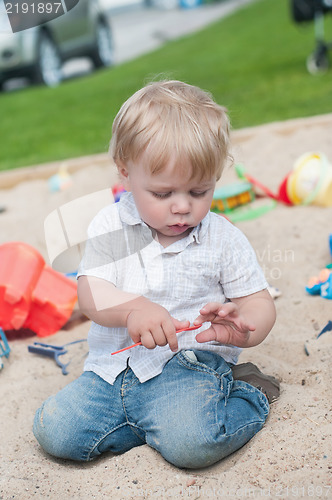 Image of Small boy playing