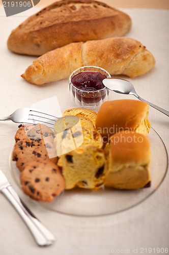 Image of bread butter and jam 
