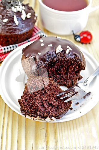 Image of Cupcake chocolate break up with a fork