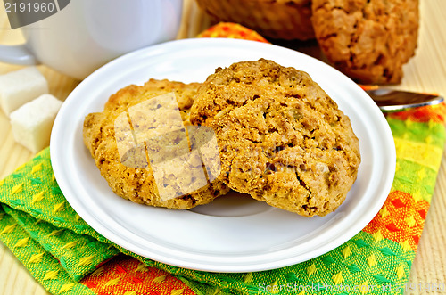 Image of Biscuits on a wooden board with a cup