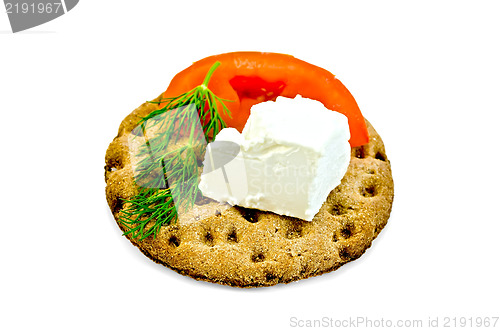 Image of Feta piece with tomato and dill on crispbread