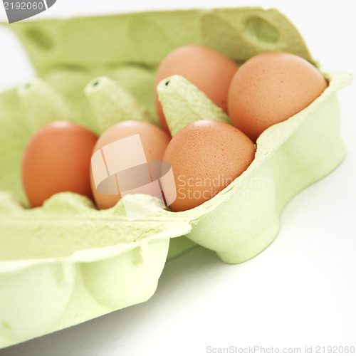 Image of Fresh eggs in a cardboard carton