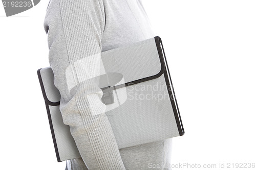 Image of Man carrying a white briefcase