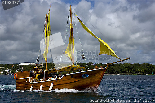 Image of tropical  pirate boat  and coastline 