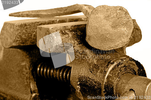 Image of Bench vise with twisted nail