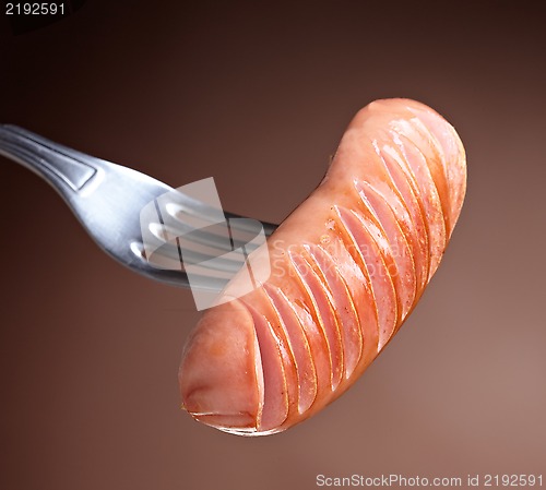 Image of Grilled sausage on a fork