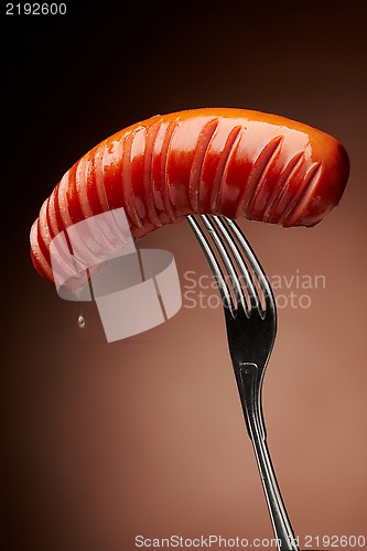 Image of Grilled sausage on a fork