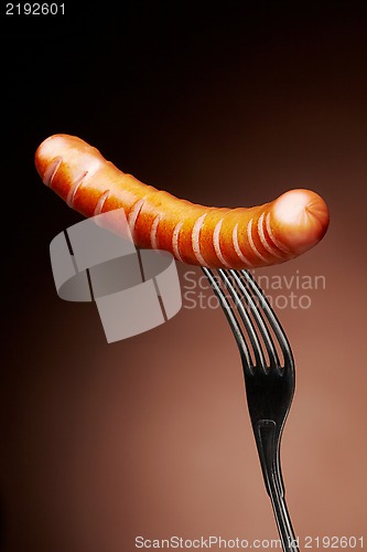 Image of Grilled sausage on a fork