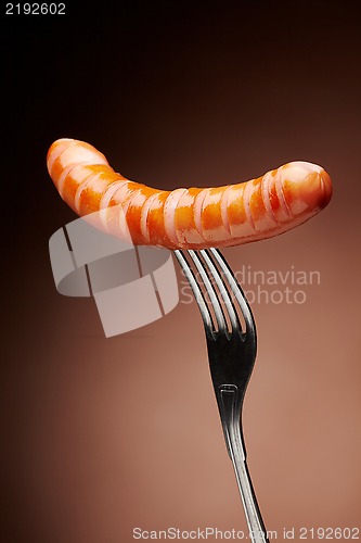 Image of Grilled sausage on a fork