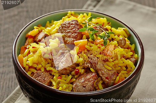 Image of Uzbek national dish plov in a bowl