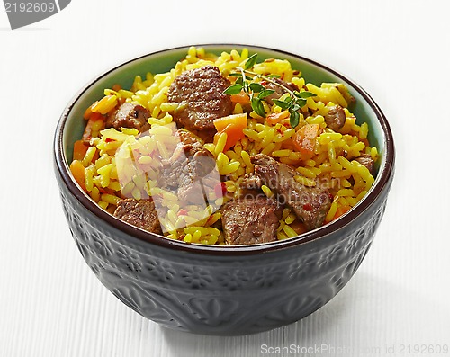 Image of Uzbek national dish plov in a bowl