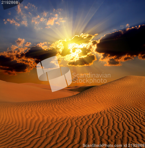 Image of dramatic suset landscape in desert