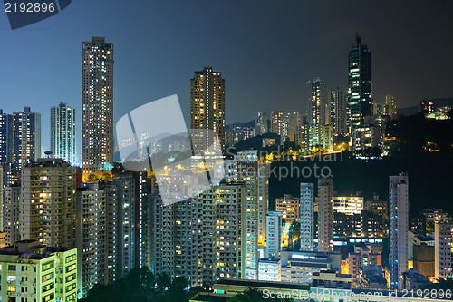 Image of apartment building at night